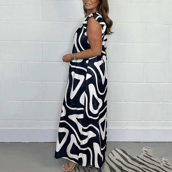 Nova - Women Abstract Print Ruffle Sleeve Wide Leg Jumpsuit